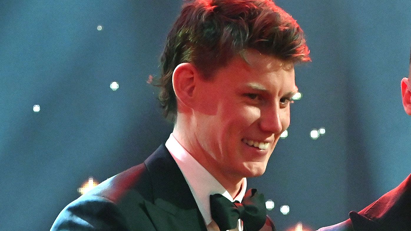 Sam Walsh of the Blues and Tom Mitchell of the Hawks chatduring the 2021 Brownlow Medal Count at NEP Studios Southbank on September 19, 2021 in Melbourne, Australia. (Photo by Quinn Rooney/Getty Images )