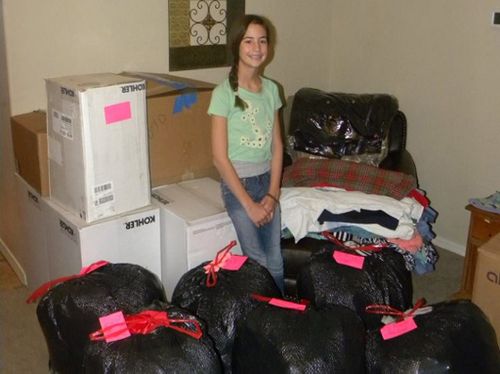 Young girl in the US runs one woman charity collecting clothes for the homeless