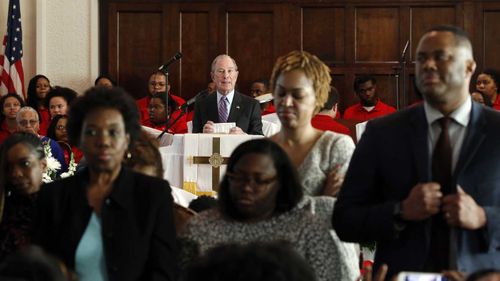 Parishioners at a church in Selma, Alabama, turn their backs to Michael Bloomberg as he addresses the congregation.