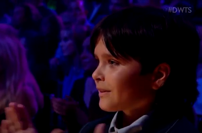 Selma Blair's son Arthur Saint Bleick claps his mother's hand during her performance on Dancing with the Stars.
