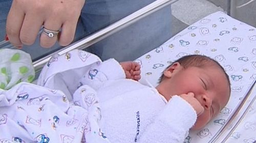 Baby Carter was brought into the world with the help of his nervous dad on the way to the hospital. (9NEWS)