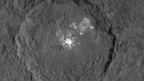 Dawn captured images of mystery white spots in the Occator crater on the dwarf planet Ceres. (Supplied) 