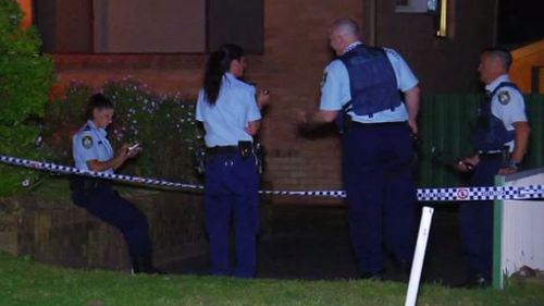 A crime scene has been established at the Budgewoi home. (9NEWS)