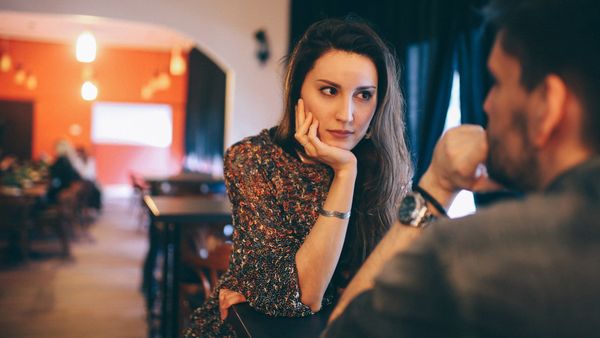 Couple having a serious discussion at restaurant