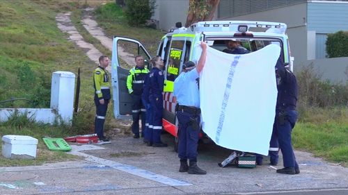 Three ambulances and multiple police vehicles attended the Church Point home after the 41-year-old man was found unconscious near his injured eight-year-old son. Picture: 9NEWS.