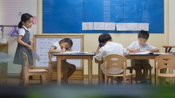 Children study at a private hagwon academy in Seoul, South Korea.