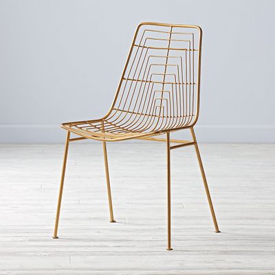 <a href="https://www.landofnod.com/gold-domino-desk-chair/s465361" target="_blank">Domino Desk Chair, $227.91.</a>