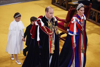 From left, Princess Charlotte, Prince Louis, Prince William and Kate, Princess of Wales, leaving the coronation ceremony of King Charles III and Queen Camilla in Westminster Abbey, London, Saturday May 6, 2023. (Yui Mok, Pool via AP)