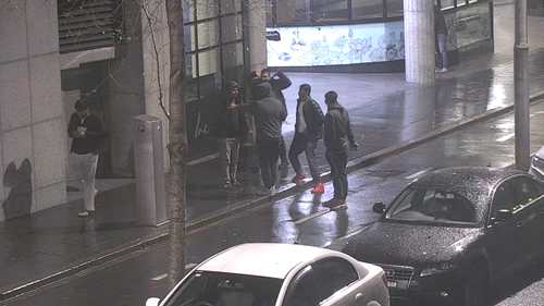 Police search for six men linked to serious assault in Sydney CBD.