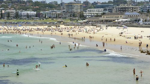 Crowds cool off at Bondi Beach today. (AAP)
