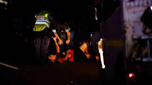Lidia Thorpe is removed by police after protesting during the Gay and Lesbian Mardi Gras parade. 