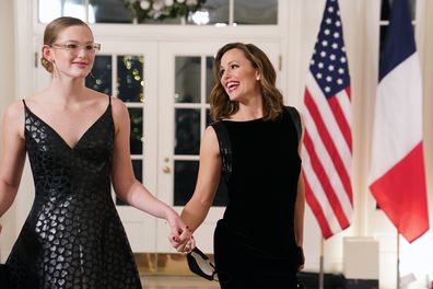 Actress Jennifer Garner and her daughter Violet arrive for the White House state dinner for French President Emmanuel Macron at the White House on December 1, 2022 in Washington, DC. The official state visit is the first for the Biden administration. 