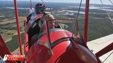 Wally Dalitz got to fly in a restored Tiger Moth plane thanks to Brisbane Biplanes.