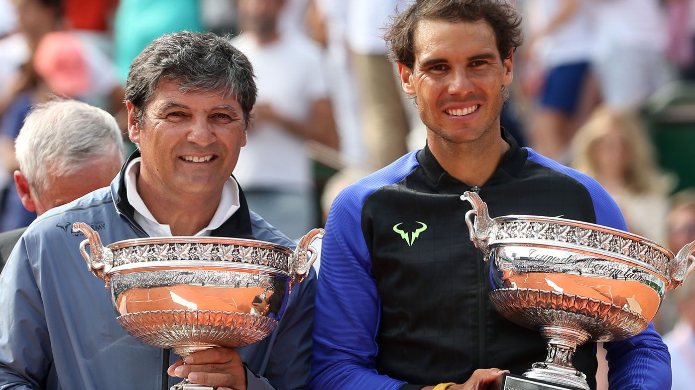 Toni Nadal and Rafael Nadal celebrate at the 2017 French Open. (Getty)
