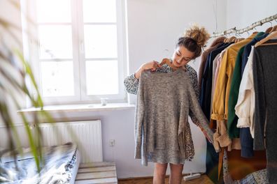 Young woman shopping at a clothing boutique