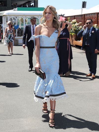 <p>Hit: This was Jennifer Hawkins' best racewear look all week. The teasing off-the shoulder neckline of the Talulah dress, fitted skirt with a playful flare and soft powder blue fabric were a style trifecta. With her hair gathered softly beneath a Natalie Bikicki headpiece, Hawkins holds her crown as the queen of the track.</p>
<p>Miss: Top form. No room for improvement.</p>