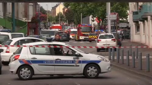 Police cordon off streets in Saint-Etienne-du-Rouvray. (AAP)