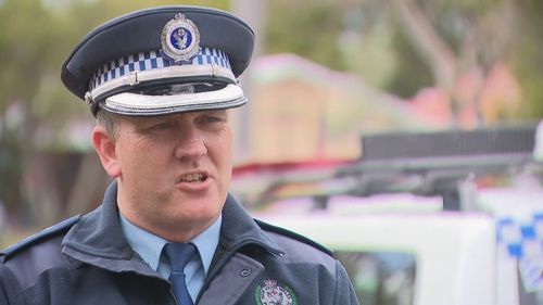 Inspector Joshua Dickson addresses a man facing charges over a crash in Villawood.