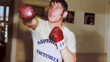 Australian boxing legend Johnny Famechon has died at the age of 77.