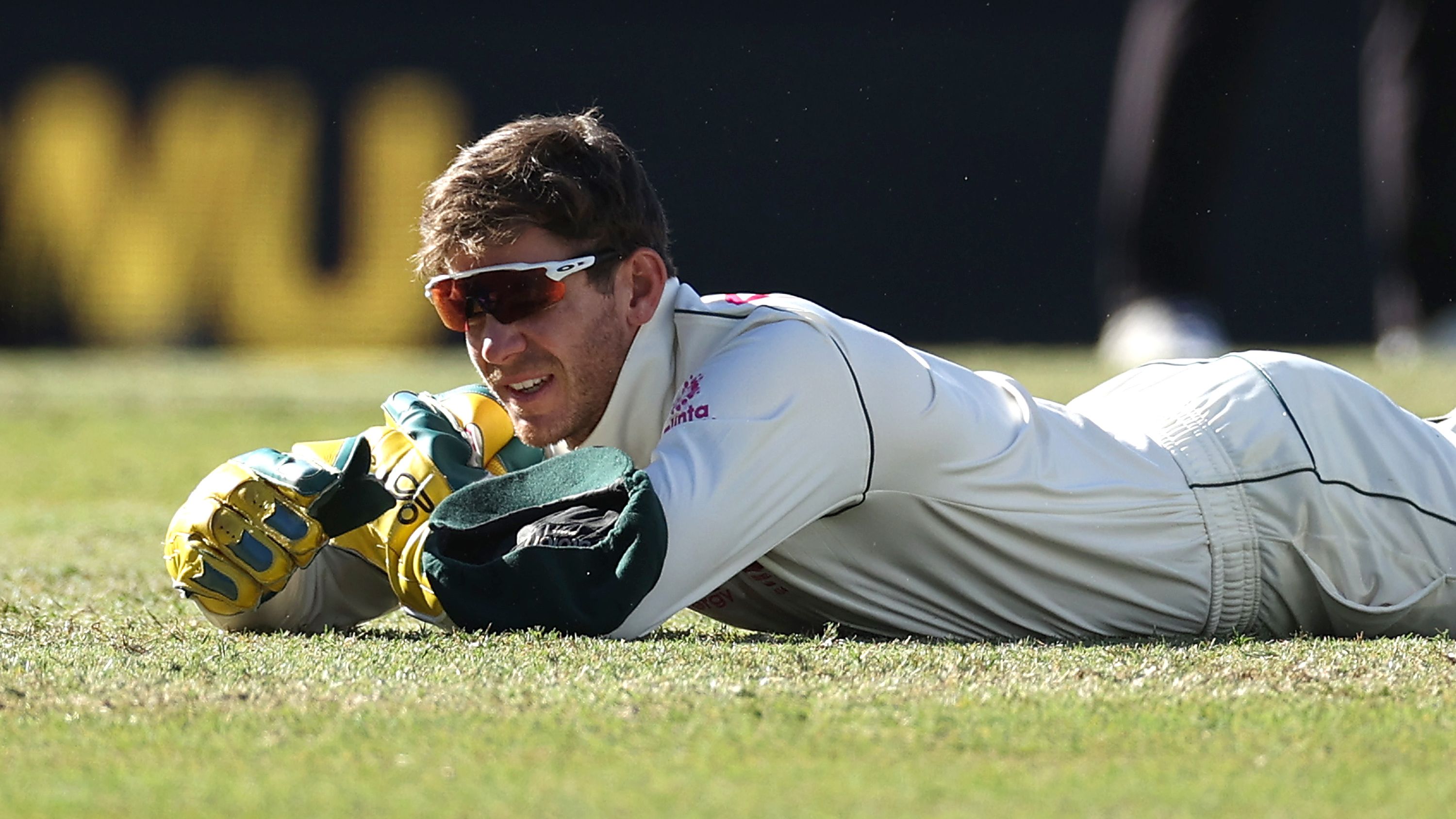 Tim Paine of Australia reacts after dropping a catch off Hanuma Vihari of India.