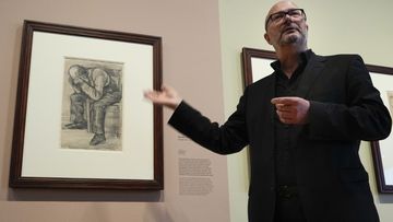 Senior researcher Teio Meedendorp gestures during the presentation of Study for &quot;Worn Out&quot;, left, a drawing by Dutch master Vincent van Gogh, dated Nov. 1882, going on public display for the first time.