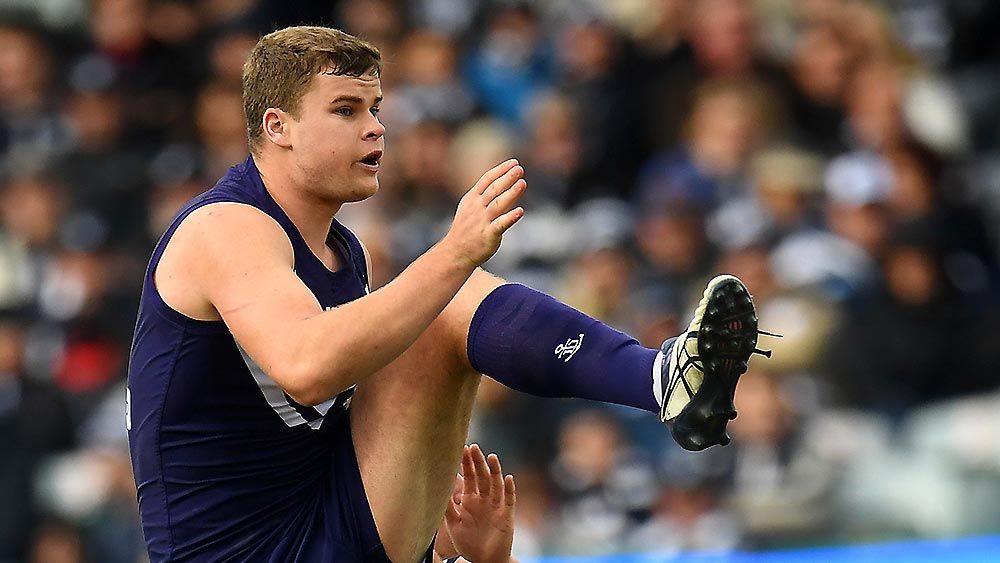 Sean Darcy of the Dockers is seen in action