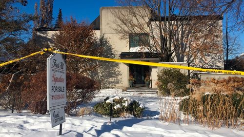 In this 2018 photo, police crime scene tape marks off the property belonging to Barry and Honey Sherman, who were found strangled inside their home.