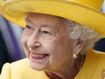 Queen beams in yellow as she opens new train line