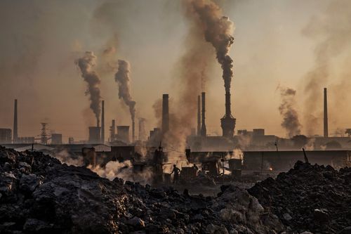 Smoke billows from a large steel plant in Inner Mongolia, China.