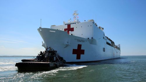 The Military Sealift Command hospital ship USNS Comfort (T-AH 20) departs Naval Station Norfolk to support hurricane relief efforts in Puerto Rico. (AP)