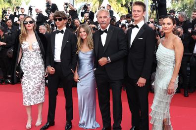 CANNES, FRANCE - MAY 19: (L-R) Lily Costner, Hayes Logan Costner, Grace Avery Costner, Kevin Costner, Cayden Wyatt Costner and Annie Costner attend the "Horizon: An American Saga" Red Carpet at the 77th annual Cannes Film Festival at Palais des Festivals on May 19, 2024 in Cannes, France. (Photo by Pascal Le Segretain/Getty Images)