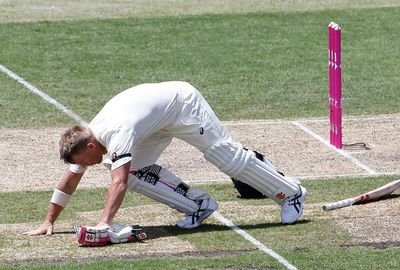 <b>David Warner offered his own poignant tribute to Phillip Hughes on the day the late batsman was immortalised at the SCG. </b><br/><br/>After reaching 63 on the first day of the Fourth Test, Warner bent down and kissed the ground where Hughes was fatally struck.<br/><br/>His gesture followed a special pre-match tribute that included the unveiling of a bronze plaque honouring Hughes' short but extraordinary career.