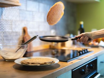 Man cooking pancakes