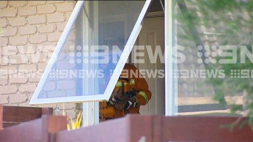 The fire was contained in the living room of the home.