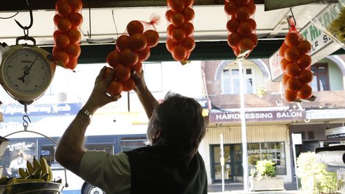 A fruit shop owner