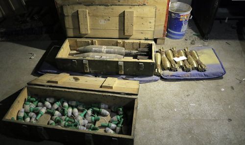 Ammunition allegedly left by rebels in an underground tunnel that was discovered in the recently-captured Jobar town, in the Eastern Ghouta, in the countryside of Damascus, Syria. (AAP)