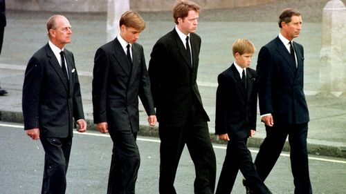 Prince Harry (second from right) walks behind his mother's coffin with grandfather Prince Philip, brother Prince William, uncle  Earl Althorp and father Prince Charles. (AAP)