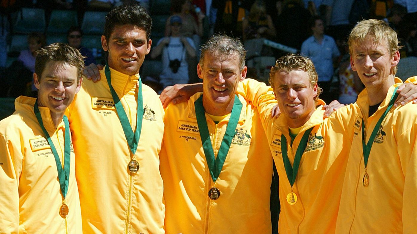 Todd Woodbridge (left) with Mark Philippoussis, John Fitzgerald, Lleyton Hewitt and Wayne Arthurs after winning the 2003 Davis Cup.