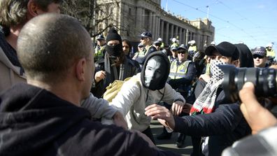 IN PICTURES: Anti-Islam and anti-racism protesters clash at Melbourne rally (Gallery)
