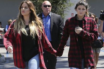 Flannel shirt? Black tee? Ripped up denim? Yep, these two definitely got the memo.<br/><br/>Is it just us, or does Kylie look a little embarrassed by their "accidental" couple-dressing?