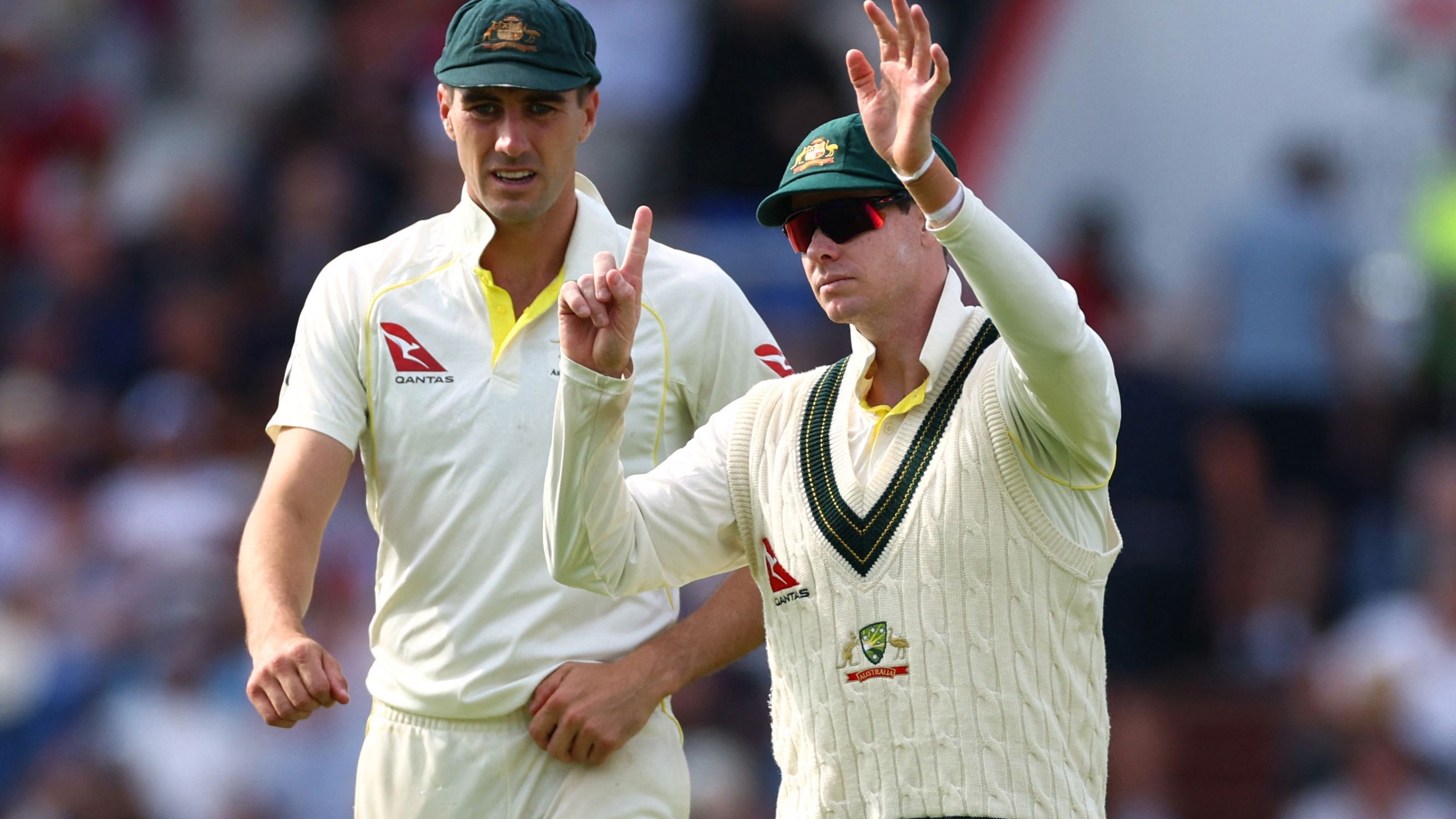 Australia&#x27;s Steve Smith with captain Pat Cummins at Old Trafford.