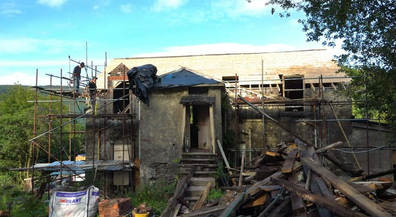 Young couple from Scotland transform a 120-year-old derelict mansion bought for $17,000 "by accident". 