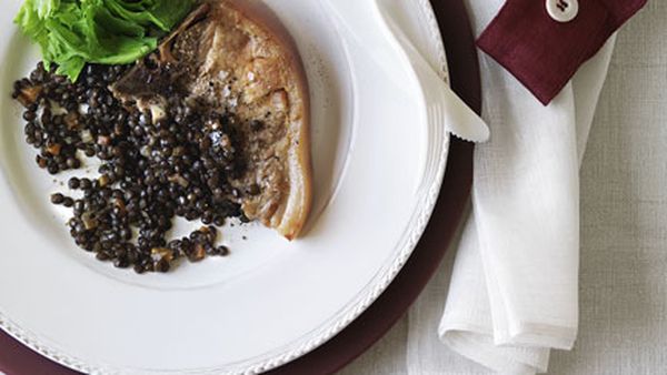 Confit pork chops with braised green lentils