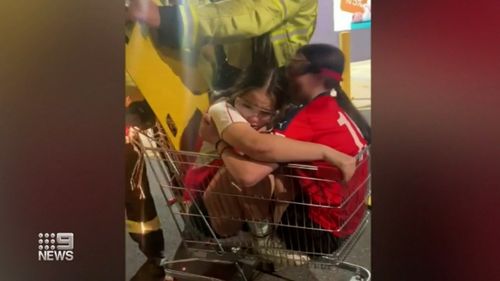 Firefighters cut the girls out of the trolley. 