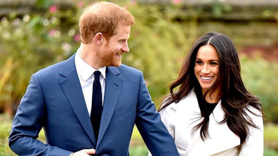 Meghan and Harry smiling