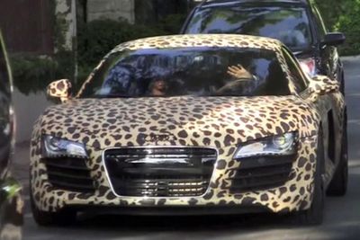 May 2013: According to TMZ, Justin has been 'wreaking havoc' on the streets of his exclusive Californian neighbourhood of Calabasas. The neighbours want Justin out for speeding his Ferrari around recklessly. In a move sure to annoy the neighbours, in July, Justin bought the tackiest Audi R8 you could find. It's leopard-print. 'Nuff said.<br/><br/>Image: Splash