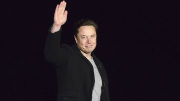 Elon Musk waves while providing an update on Starship, on Feb. 10, 2022, near Brownsville, Texas. Twitter on Thursday, Dec. 15, 2022, suspended the accounts of journalists who cover the social media platform and Musk.