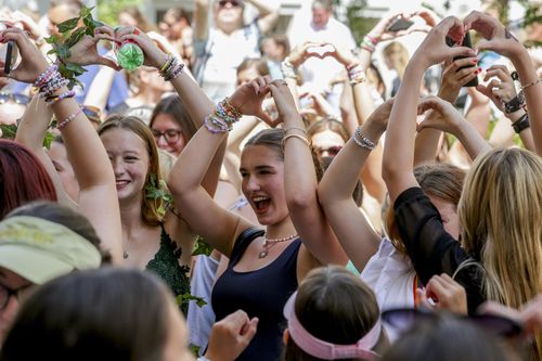 Swifties sing and dance in Vienna on Friday, August 9, 2024. 