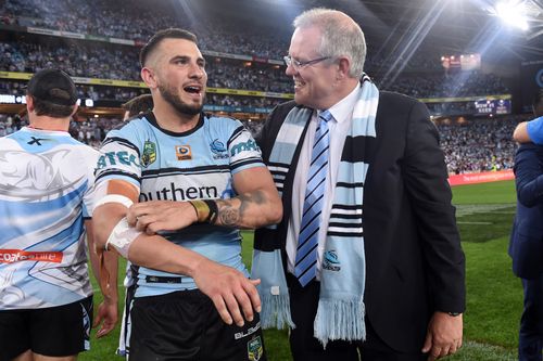 Sco-Mo with Jake Bird after his beloved Sharkies won the 2016 Grand Final.