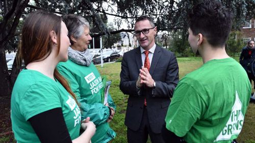 Greens volunteer bitten in clash at Victorian voting station